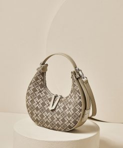 3d8f80de-47c2-4f2a-a9be-dda2c8c46c25.jpg Woolen Crescent Canvas Niche Women's Bag