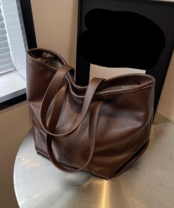 d0efd80d-3a37-48da-b7cf-ec7507fa28dd.jpg Niche, High-end Commuting Retro Women's Tote Bag
