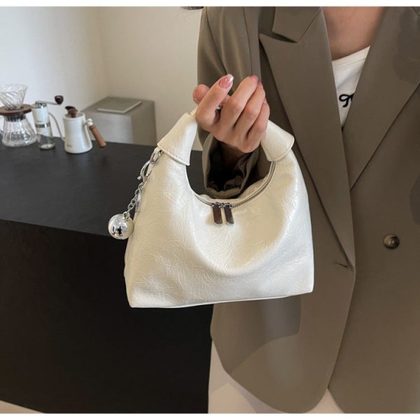e98b75f1-fd8d-4a73-82c3-5bab75eeea97.jpg High-grade Light Luxury Glossy Dumpling Bag Casual
